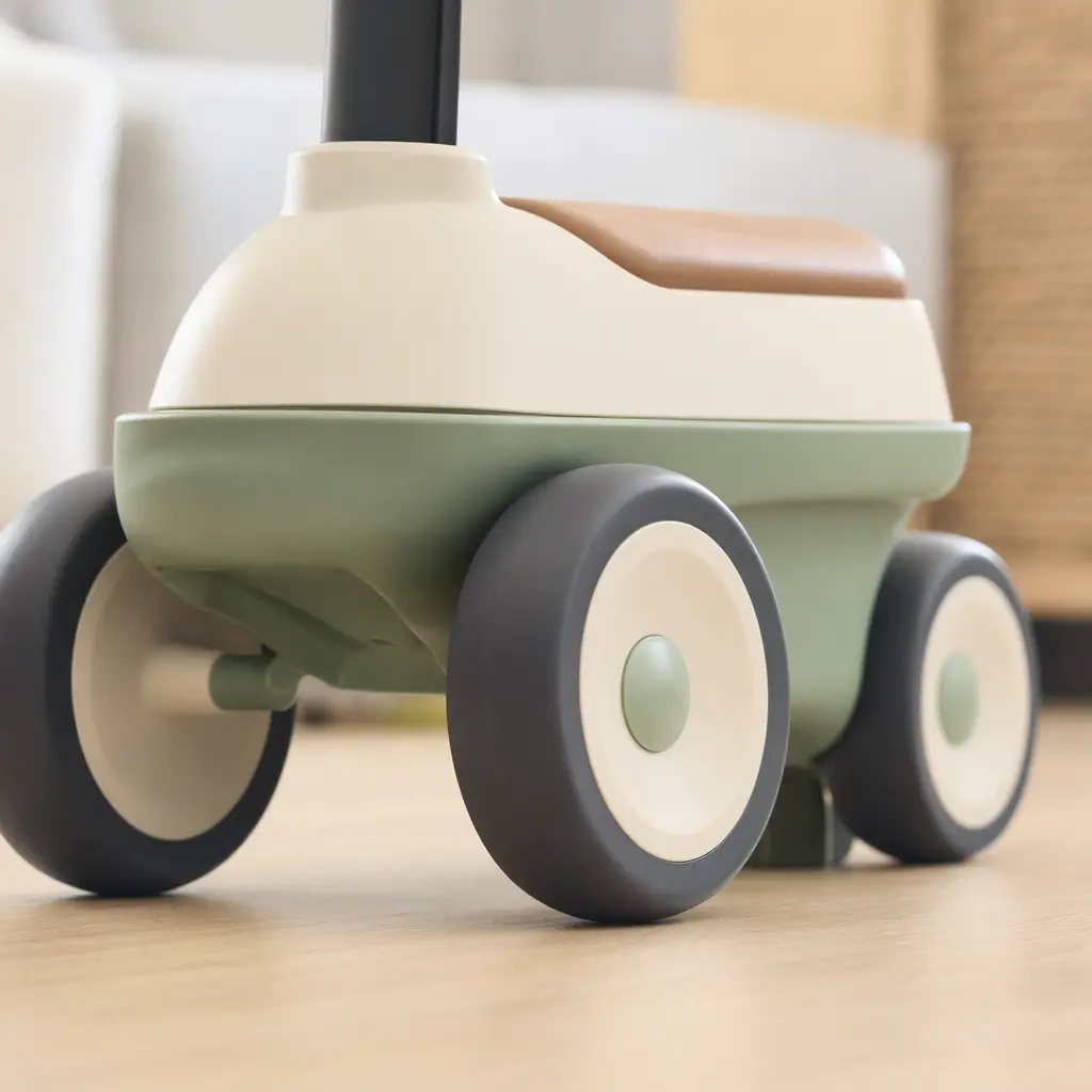 Close-up of non-marking wheels on an indoor toddler ride-on