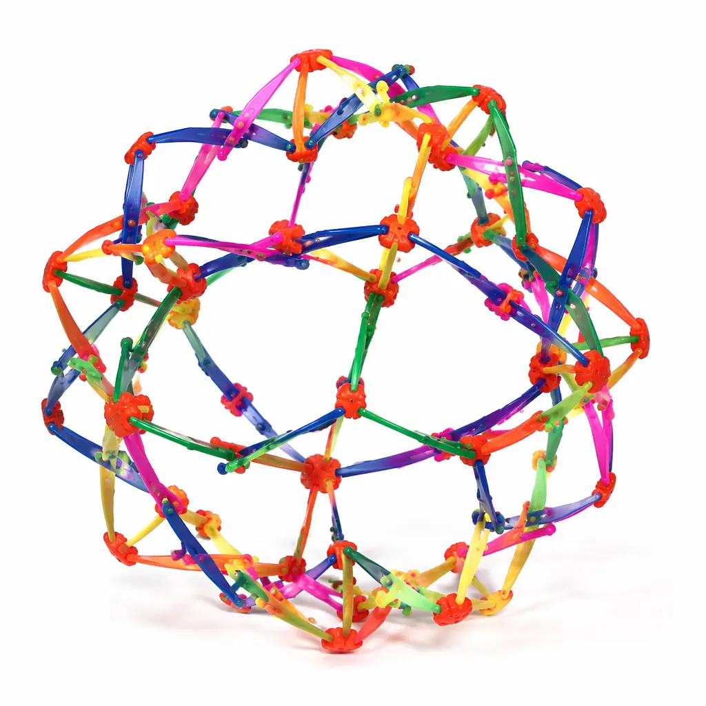 An expandable geometric sphere toy shown half open, revealing its intricate lattice structure.