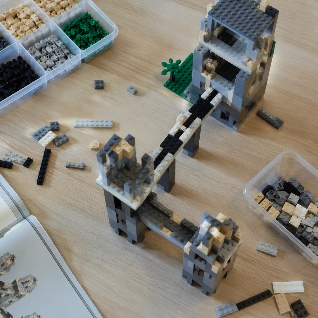 Partially built towers and bridges made from construction toys