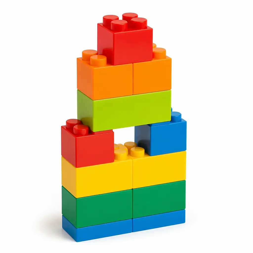 Large colorful interlocking building blocks stacked into a simple tower