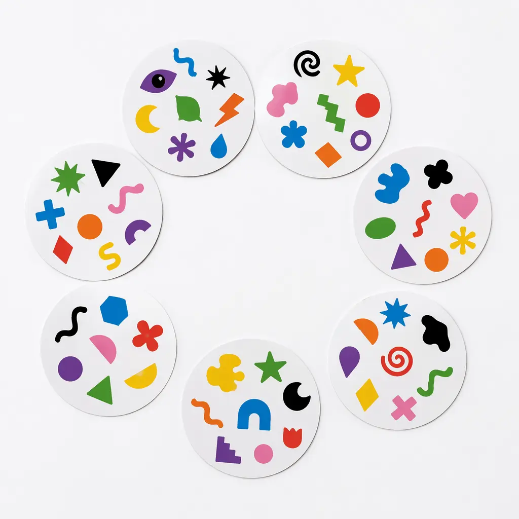 Round cards with colorful symbols arranged on a table, suggesting a fast-paced matching game.