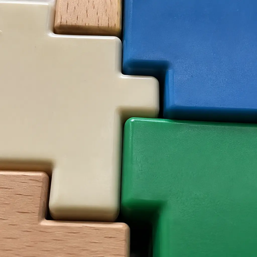 Close-up of sturdy building pieces connected firmly